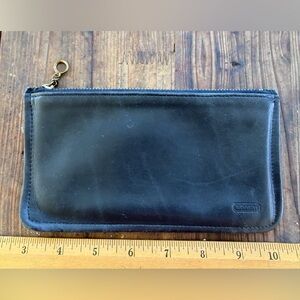 Vintage Coach navy Skinny case. Soft leather brass zipper and pull.